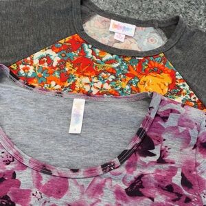 2 LuLaRoe shirts. Size small. Like new.